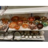 CARNIVAL GLASS; a collection of mainly orange Carnival glass, also some blackberry, mainly bowls,