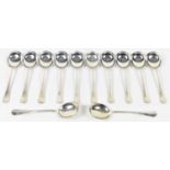 COOPER BROTHERS & SONS LTD; a set of twelve George V hallmarked silver soup spoons, Sheffield