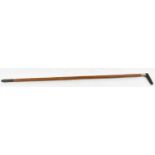 A bamboo measuring stick with white metal ferrule and horn handle, length 89cm.