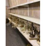 A large quantity of lighting including gilt brass, cut glass and other chandeliers, wall lights, etc