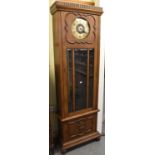 An early 20th century oak cased longcase clock, height 210cm.