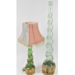 Two decorative wine bottles, one converted to a table lamp, height of largest 83cm.