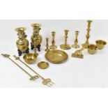 A small quantity of brassware including candlesticks, two bowls, two plates, a pair of vases, etc.