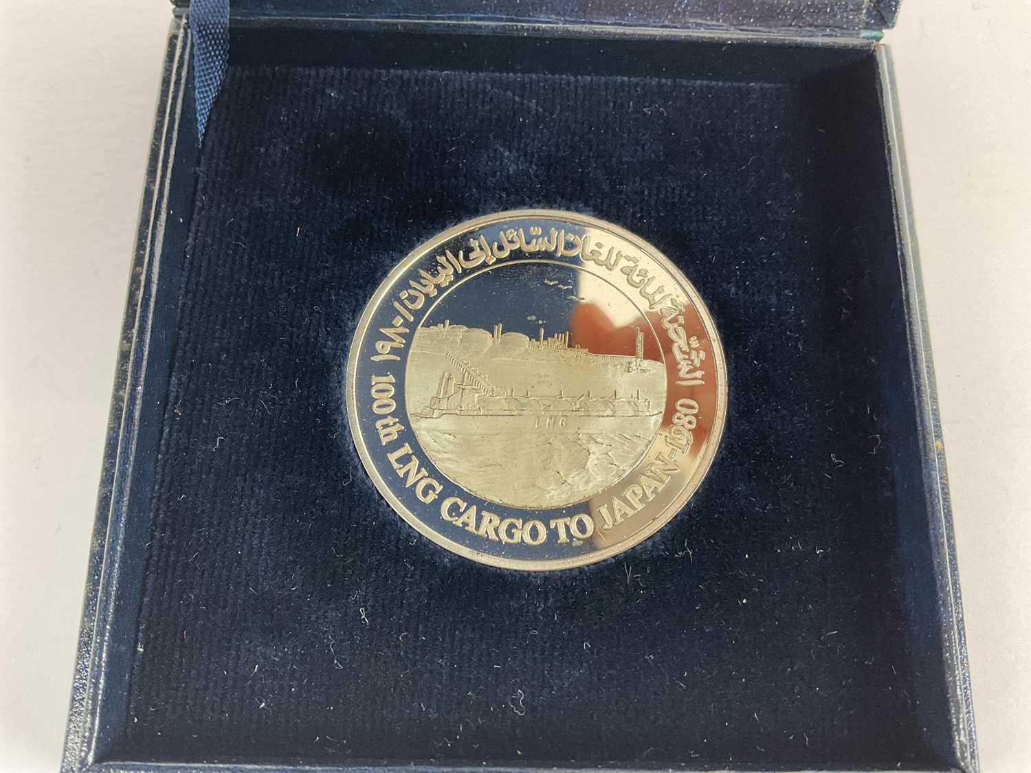 A cased Abu Dhabi Gas Liquefaction100th LNG Cargo to Japan 1980 silver coin. - Image 3 of 3