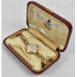 ZENITH; a 9ct yellow gold lady's wristwatch, with engraved presentation inscription verso and