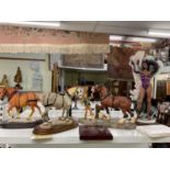 A group of four limited edition figures including three Shire horses, two model shire horses by