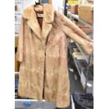 A Dickens & Jones light mink fur coat.