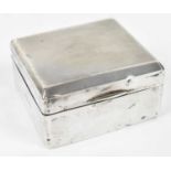 WILLIAM NEALE LTD; a George V hallmarked silver cigarette box, Birmingham 1935.