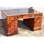 A good Victorian mahogany partner's desk of typical form, the primary side fitted with nine drawers,
