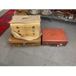 Two vintage suitcases, the largest measuring 74cms x 50cms and a pig skin travelling trunk measuring