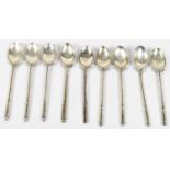 MARPLES & BAYLISS; a set of nine George V hallmarked silver golfing spoons, Birmingham 1935, 4.