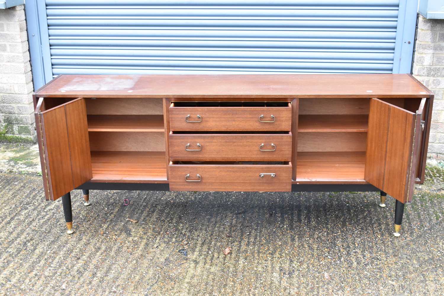 A mid-century sideboard with three central drawers flanked by two cupboard doors, width 191cm, a - Image 3 of 7