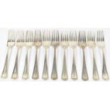 SPAULDING & CO; a set of eleven sterling silver forks, length 18cm, approx 20.2ozt/628g.