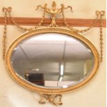 An ornate giltwood frame wall mirror, height 60cm.