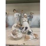 LLADRO; three figures of children including a sleeping baby on a bassinet plus five further Nao