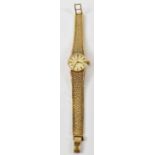 OMEGA; a 9ct yellow gold lady's wristwatch with bracelet strap.