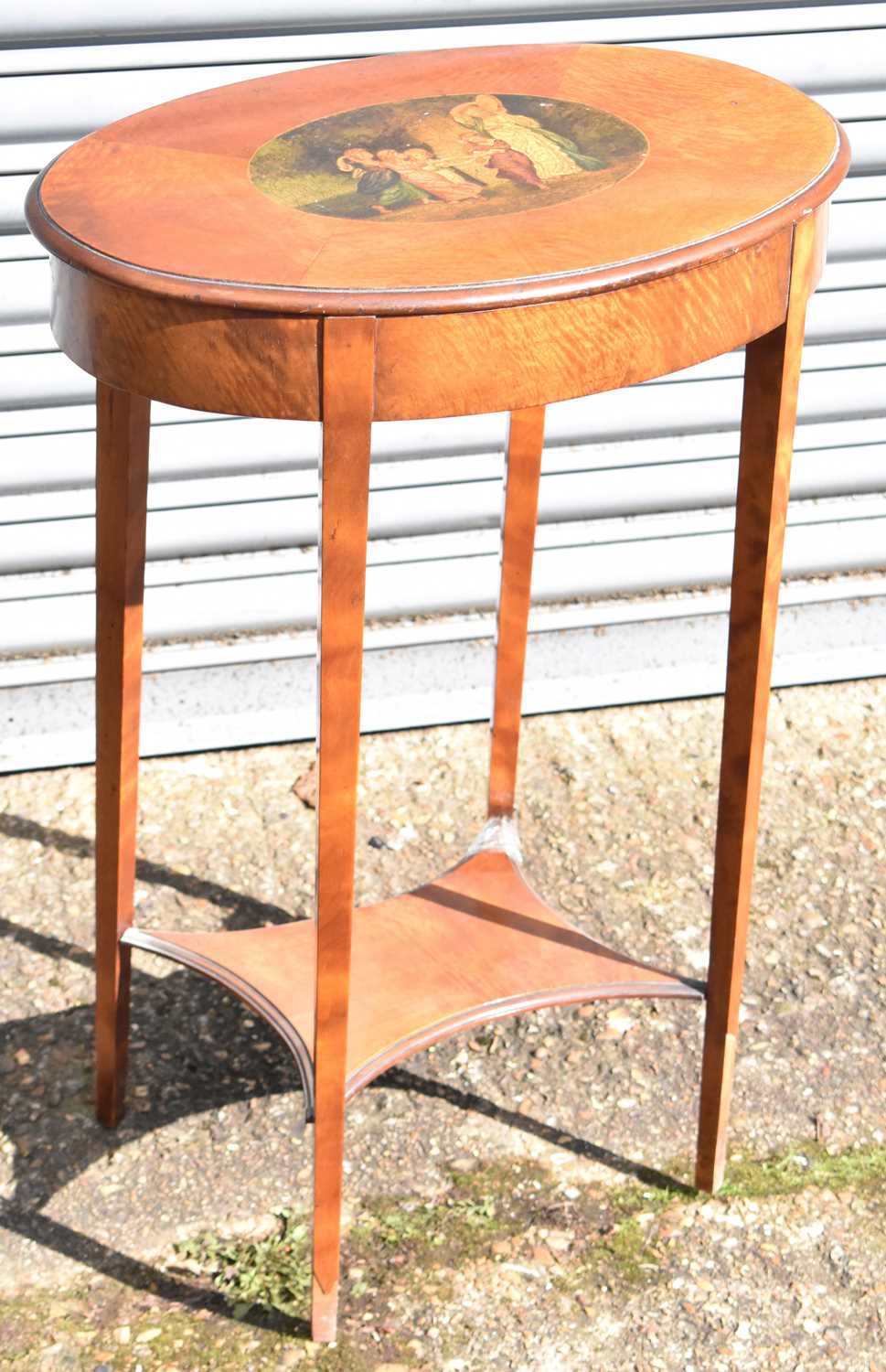 A 19th century sewing table with painted top (possibly bird's eye maple), 73 cms high, 53 cms wide