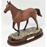 ROYAL DOULTON; a limited edition figure 'Arkle', 204/5000, on plinth base.