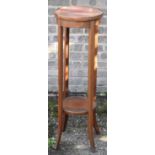 An Edwardian mahogany two tier jardiniere stand, height 95cm.