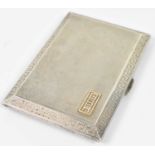 ASPREY & CO; a George V hallmarked silver cigarette case with engine turned decoration, London 1928,