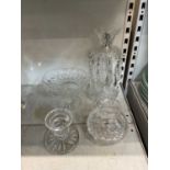 WATERFORD; four pieces of Waterford crystal comprising of a crstal drop candlestick, a candle