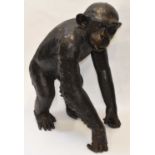 A large decorative bronze figure of a chimp standing on all fours, height 76cm.