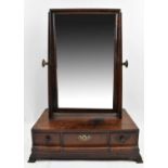 A George III mahogany toilet mirror, the rectangular bevelled plate above three drawers, width 41.