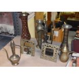 A small quantity of Eastern brass metalware including three coffee pots, three vases, and two