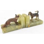 A pair of onyx and cold painted bronze bookends, with cold painted bronze fox and hound, width 11.