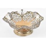 ROBERTS & BELK; a George V hallmarked silver hexagonal pierced bonbon dish spreading circular