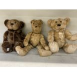 A vintage humpback teddy bear, with two other teddy bears (3).