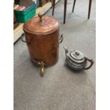 A large copper tea urn with lid, height 38cm.