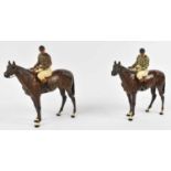 A pair of Austrian cold painted bronzes of jockeys on horseback, height 26cm.