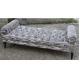 A modern button upholstered chaise longue/day bed.