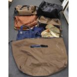 A collection of gentleman's bags and luggage including brown Hackett bag, black leather bag,