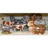 A Staffordshire rabbit tureen (af), a Michael Caugant rabbit tureen and another by Price Kensington,