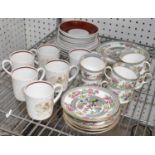 A Susie Cooper six-setting tea service comprising six cups, saucers and plates, and an Aynsley