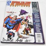 A Guide to The DC Universe 2001-2002 comic, signed by Dan Abnett, also another indistinct signature.