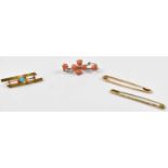 A 14ct gold bar brooch set with a turquoise, a 14ct gold safety pin and another in yellow metal,