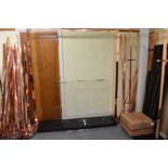 A large quantity of heavy copper effect metal framed clothes rails with ten assorted black lacquer