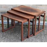 A nest of three Danish hardwood occasional tables.