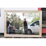 A large modern gilt frame rectangular wall mirror, 205 x 144cm.