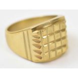 A yellow metal gents ring, stamped 18k, size U, approx 12.1g.
