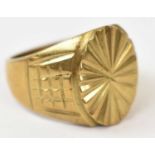 A yellow metal gents ring, stamped 18k, size W/X, approx 15.3g.