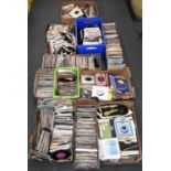 A large collection of 45s and other various records.