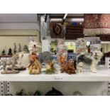 A group of ten ceramic models of predominantly dogs, also squirrels and a raccoon (10).