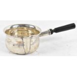 A small French silver saucepan with pouring spout, diameter 11.5cm, 7.2ozt/224g (including handle).