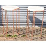 A pair of modern side tables with hexagonal marble effect tops on coppered bases. ***This lot