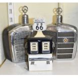 Two novelty Mercedes hip flasks and a novelty Route 66 toothpick holder.