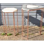 A modern side/display table with shaped top on coppered base and a smaller hexagonal example with